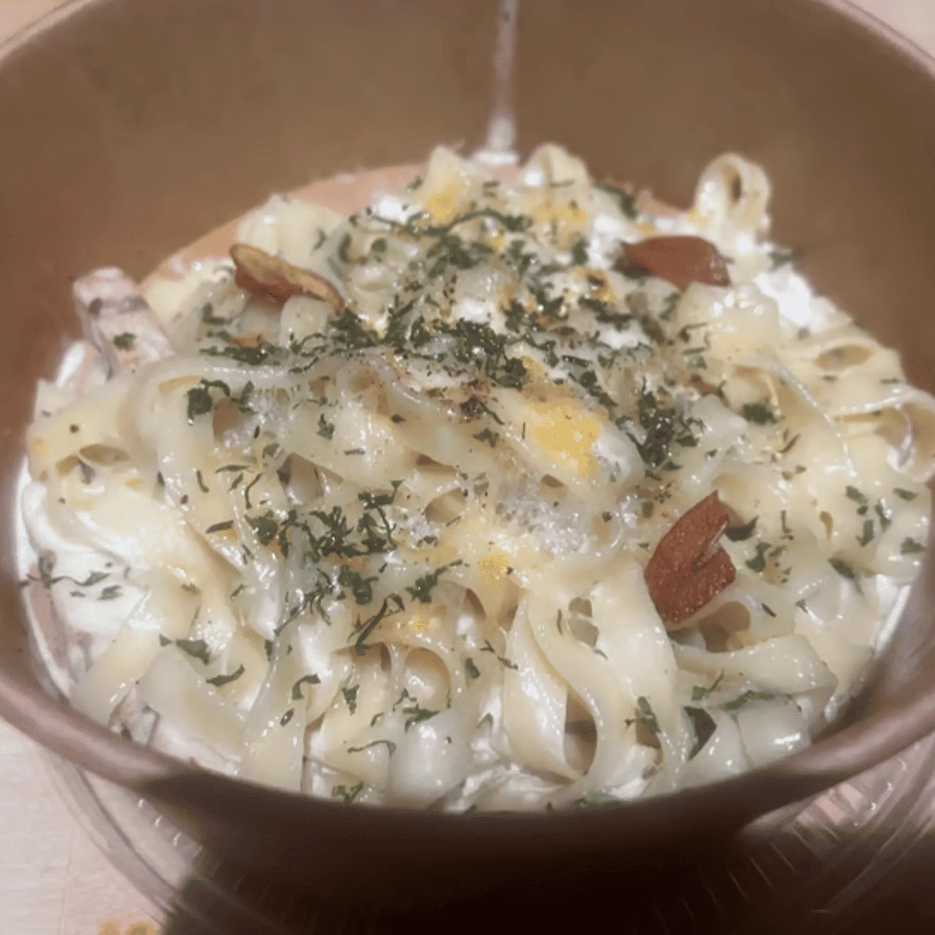 Signature creamy Alfredo pasta at Aglio Italian restaurant in Shawnessy, Calgary